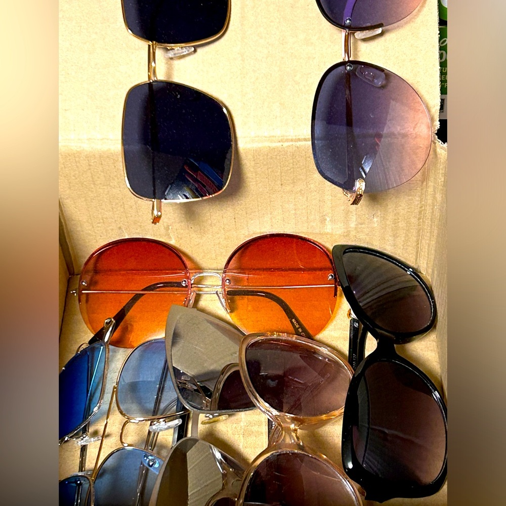 Box of sunglasses and cases